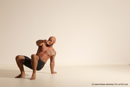 Underwear Gymnastic poses Man Black Muscular Bald Dancing Dynamic poses Academic