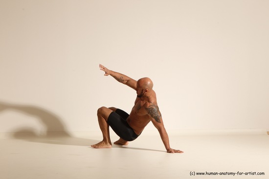 Underwear Gymnastic poses Man Black Muscular Bald Dancing Dynamic poses Academic