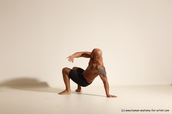 Underwear Gymnastic poses Man Black Muscular Bald Dancing Dynamic poses Academic