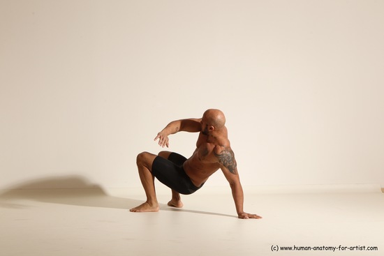 Underwear Gymnastic poses Man Black Muscular Bald Dancing Dynamic poses Academic