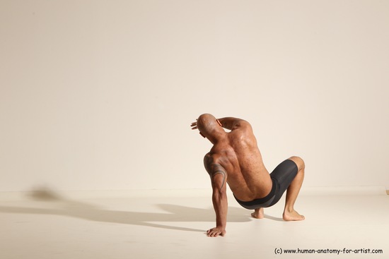 Underwear Gymnastic poses Man Black Muscular Bald Dancing Dynamic poses Academic