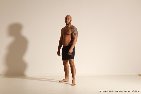 Underwear Gymnastic poses Man Black Muscular Bald Dancing Dynamic poses Academic