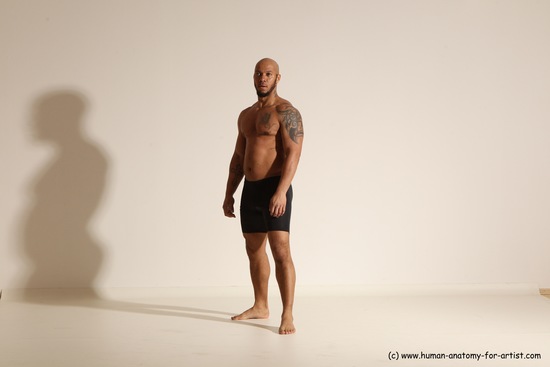 Underwear Gymnastic poses Man Black Muscular Bald Dancing Dynamic poses Academic