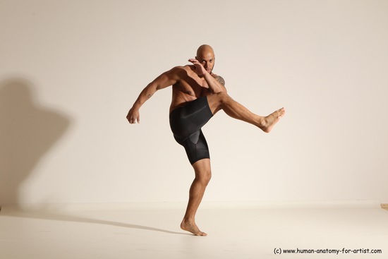 Underwear Gymnastic poses Man Black Muscular Bald Dancing Dynamic poses Academic