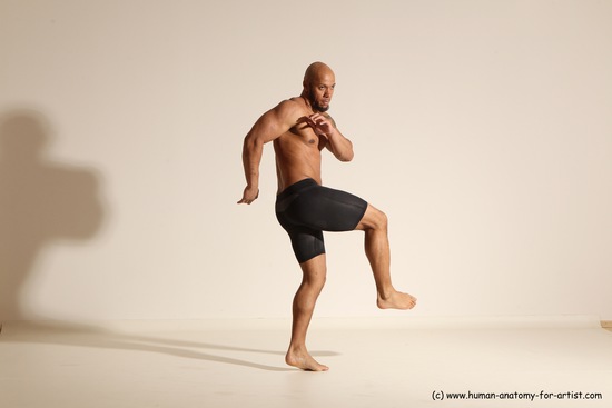 Underwear Gymnastic poses Man Black Muscular Bald Dancing Dynamic poses Academic