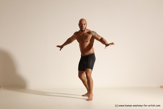 Underwear Gymnastic poses Man Black Muscular Bald Dancing Dynamic poses Academic