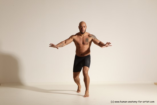 Underwear Gymnastic poses Man Black Muscular Bald Dancing Dynamic poses Academic