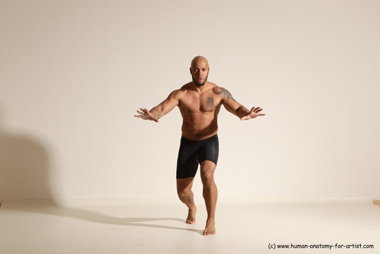 Underwear Gymnastic poses Man Black Muscular Bald Dancing Dynamic poses Academic