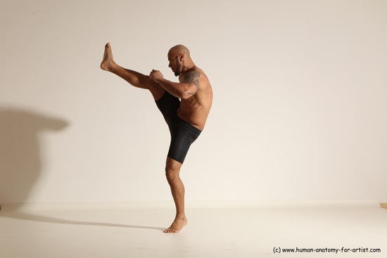 Underwear Gymnastic poses Man Black Muscular Bald Dancing Dynamic poses Academic