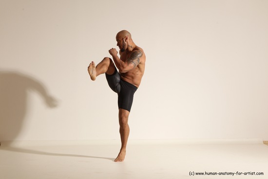 Underwear Gymnastic poses Man Black Muscular Bald Dancing Dynamic poses Academic