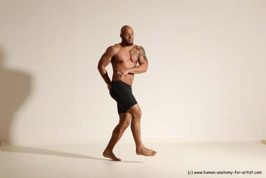 Underwear Gymnastic poses Man Black Muscular Bald Dancing Dynamic poses Academic