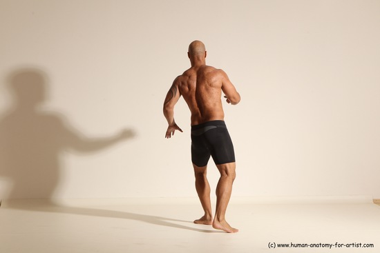 Underwear Gymnastic poses Man Black Muscular Bald Dancing Dynamic poses Academic