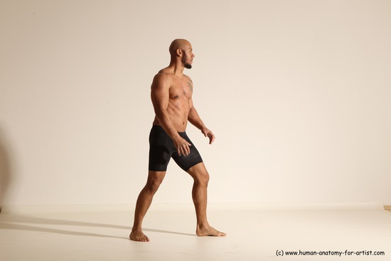 Underwear Gymnastic poses Man Black Muscular Bald Dancing Dynamic poses Academic