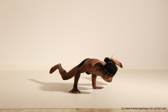 Underwear Gymnastic poses Man Black Athletic Black Dancing Dreadlocks Dynamic poses Academic