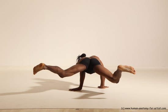 Underwear Gymnastic poses Man Black Athletic Black Dancing Dreadlocks Dynamic poses Academic