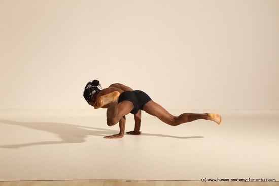 Underwear Gymnastic poses Man Black Athletic Black Dancing Dreadlocks Dynamic poses Academic