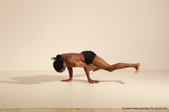 Underwear Gymnastic poses Man Black Athletic Black Dancing Dreadlocks Dynamic poses Academic