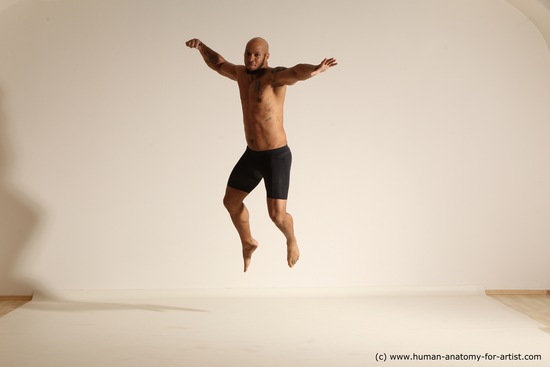 Underwear Gymnastic poses Man Black Muscular Bald Dancing Dynamic poses Academic