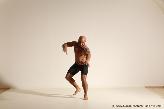 Underwear Gymnastic poses Man Black Muscular Bald Dancing Dynamic poses Academic