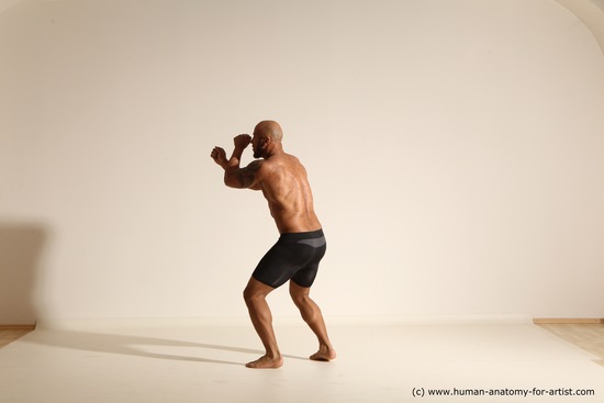 Underwear Gymnastic poses Man Black Muscular Bald Dancing Dynamic poses Academic