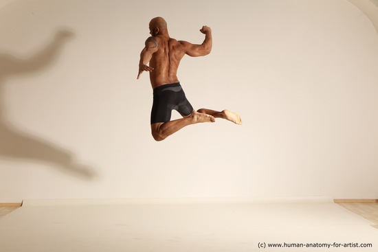 Underwear Gymnastic poses Man Black Muscular Bald Dancing Dynamic poses Academic