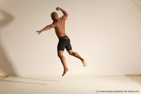 Underwear Gymnastic poses Man Black Muscular Bald Dancing Dynamic poses Academic