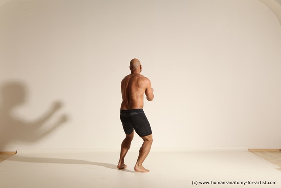 Underwear Gymnastic poses Man Black Muscular Bald Dancing Dynamic poses Academic