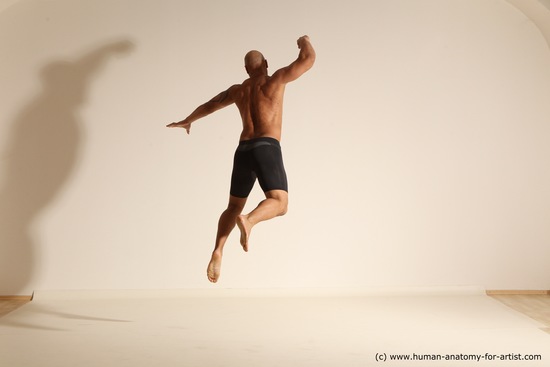 Underwear Gymnastic poses Man Black Muscular Bald Dancing Dynamic poses Academic