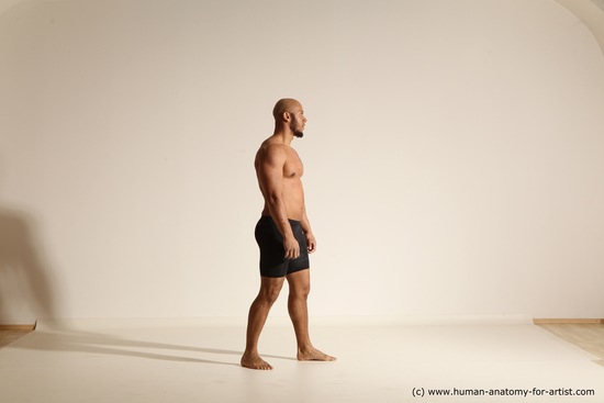 Underwear Gymnastic poses Man Black Muscular Bald Dancing Dynamic poses Academic