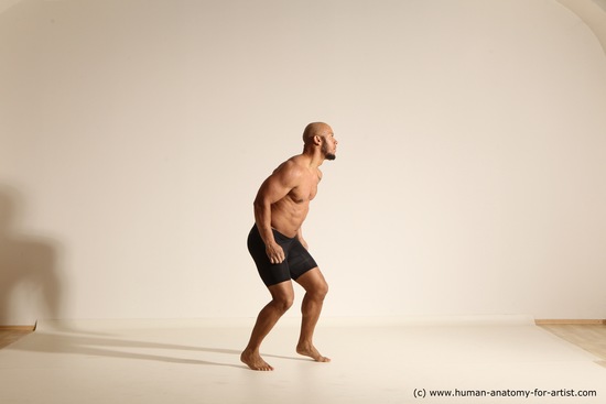 Underwear Gymnastic poses Man Black Muscular Bald Dancing Dynamic poses Academic