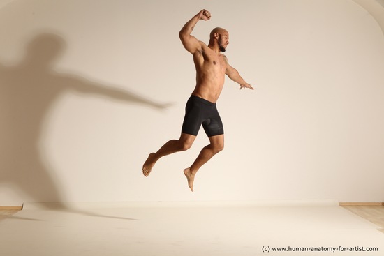 Underwear Gymnastic poses Man Black Muscular Bald Dancing Dynamic poses Academic