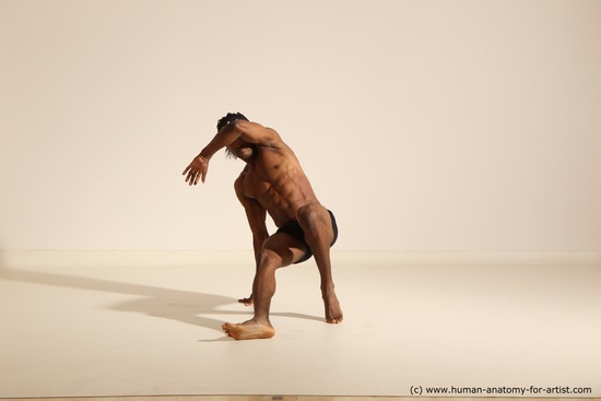 Underwear Gymnastic poses Man Black Athletic Black Dancing Dreadlocks Dynamic poses Academic