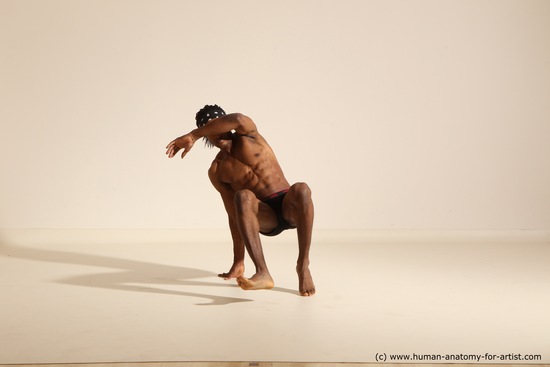 Underwear Gymnastic poses Man Black Athletic Black Dancing Dreadlocks Dynamic poses Academic