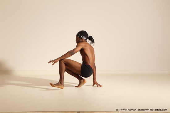 Underwear Gymnastic poses Man Black Athletic Black Dancing Dreadlocks Dynamic poses Academic