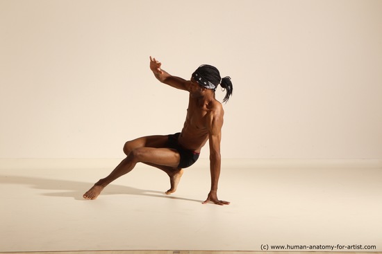 Underwear Gymnastic poses Man Black Athletic Black Dancing Dreadlocks Dynamic poses Academic