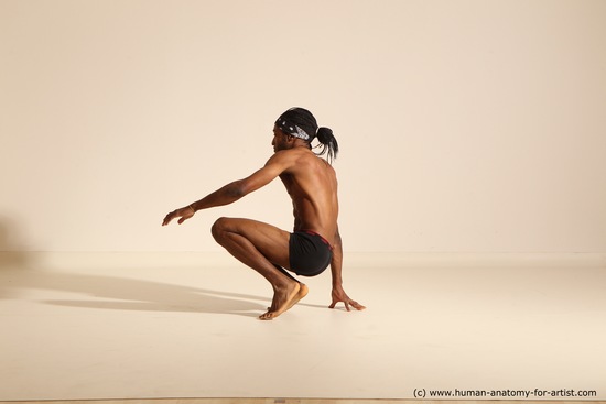 Underwear Gymnastic poses Man Black Athletic Black Dancing Dreadlocks Dynamic poses Academic