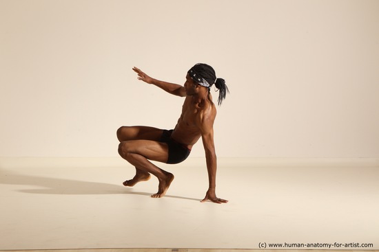 Underwear Gymnastic poses Man Black Athletic Black Dancing Dreadlocks Dynamic poses Academic