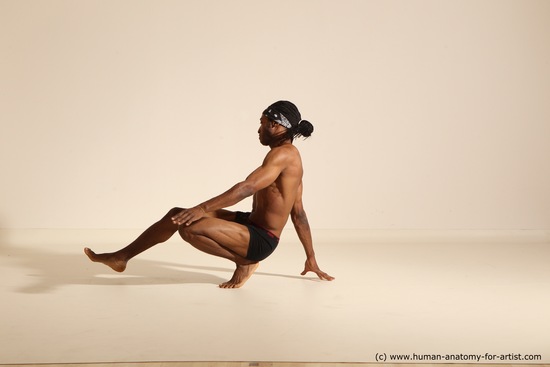 Underwear Gymnastic poses Man Black Athletic Black Dancing Dreadlocks Dynamic poses Academic