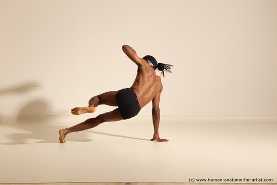 Underwear Gymnastic poses Man Black Athletic Black Dancing Dreadlocks Dynamic poses Academic