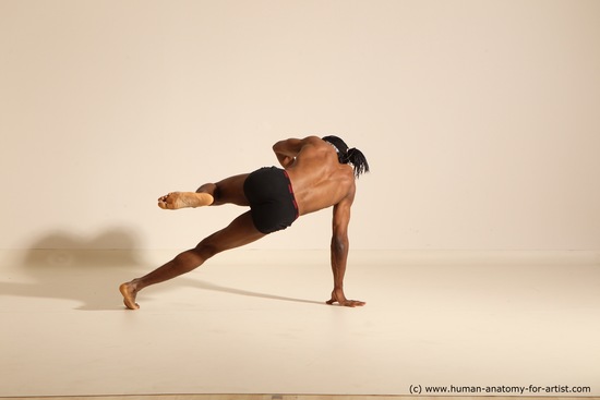 Underwear Gymnastic poses Man Black Athletic Black Dancing Dreadlocks Dynamic poses Academic