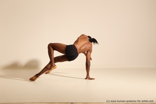 Underwear Gymnastic poses Man Black Athletic Black Dancing Dreadlocks Dynamic poses Academic