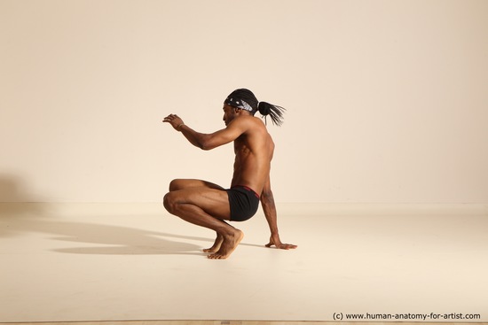 Underwear Gymnastic poses Man Black Athletic Black Dancing Dreadlocks Dynamic poses Academic