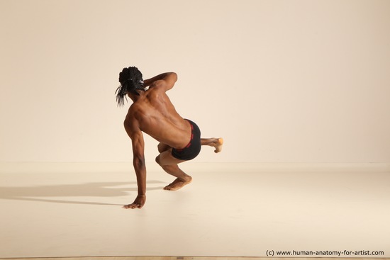 Underwear Gymnastic poses Man Black Athletic Black Dancing Dreadlocks Dynamic poses Academic