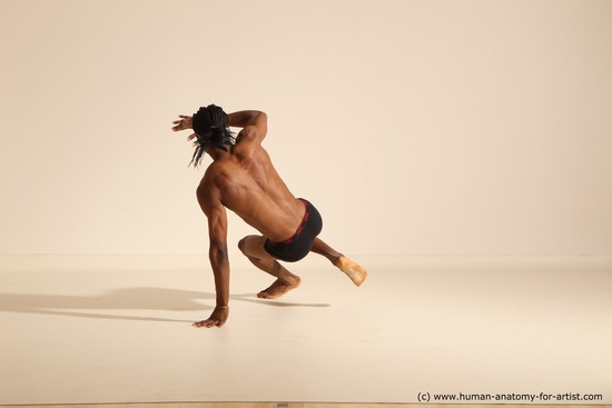 Underwear Gymnastic poses Man Black Athletic Black Dancing Dreadlocks Dynamic poses Academic