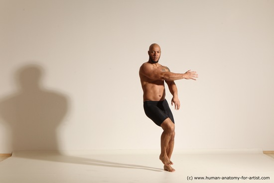 Underwear Gymnastic poses Man Black Muscular Bald Dancing Dynamic poses Academic