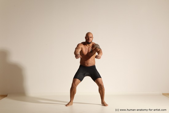 Underwear Gymnastic poses Man Black Muscular Bald Dancing Dynamic poses Academic