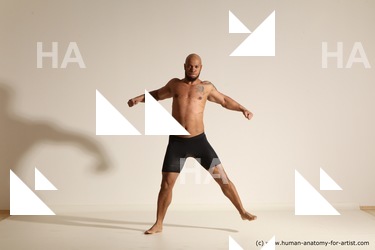 Underwear Gymnastic poses Man Black Muscular Bald Dancing Dynamic poses Academic