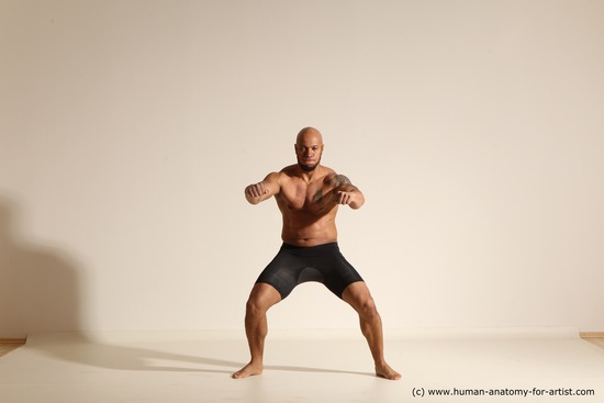 Underwear Gymnastic poses Man Black Muscular Bald Dancing Dynamic poses Academic