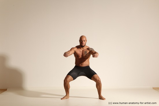 Underwear Gymnastic poses Man Black Muscular Bald Dancing Dynamic poses Academic