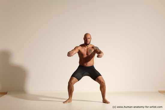 Underwear Gymnastic poses Man Black Muscular Bald Dancing Dynamic poses Academic